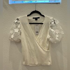 NWT - French Connection sweater with flower sleeves.